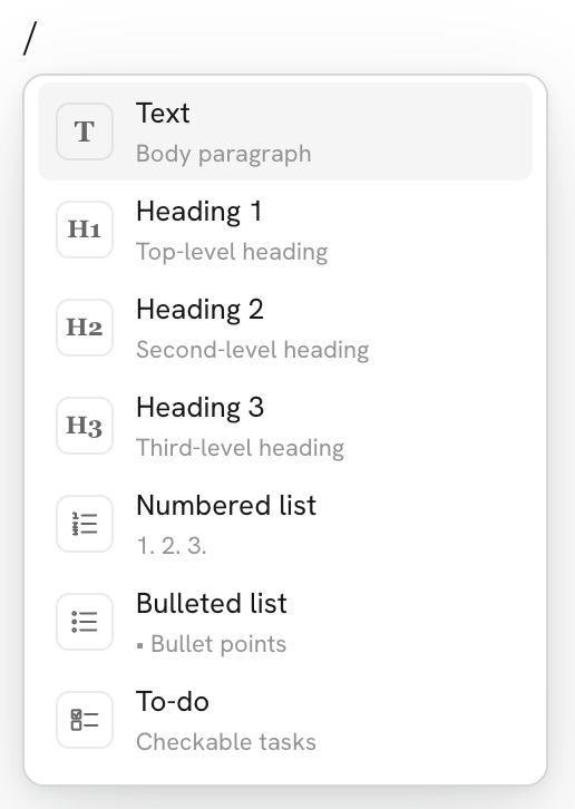 The insert menu that opens when you type a slash, with text, headings, numbered and bulleted lists, and to-dos
